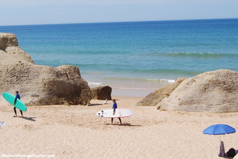 Surfers in Praia da Galé, Albufeira, Algarve